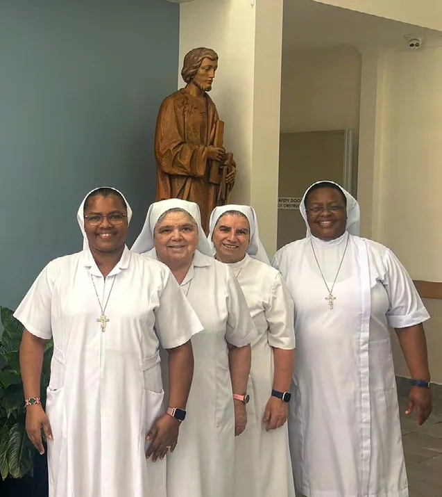 Four religious sisters in white habits at Francis of Assisi Home in Mackay